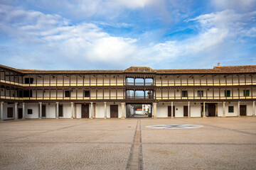 Panoramic view of the monumental Plaza Mayor of Tembleque de Toledo, Castilla la Mancha, Spain, with its wooden balconies and porticos