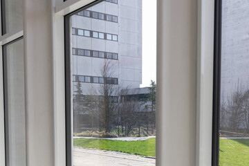 Large window closeup overlooking a modern building