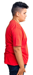 Fototapeta premium Little boy kid wearing casual clothes looking to side, relax profile pose with natural face with confident smile.