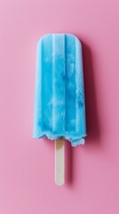 Blue popsicle on pink background