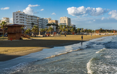 Larnaca, Cyprus - 29 March 2023: Beautiful view of the main street of Larnaca and Phinikoudes beach...