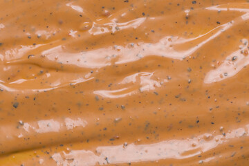 Whipped delicious sauce texture. Hamburger sauce background.