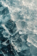 Fototapeta premium A pile of ice sitting on top of a body of water. Can be used for climate change or winter themed designs