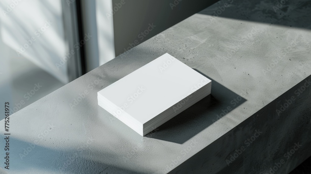 Poster a white box sitting on top of a table. perfect for product display