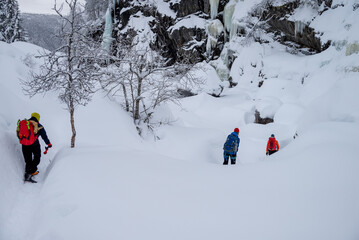 Three Climbers Approaching Icefall in Rjukan Valley