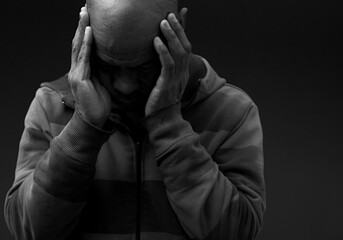 deaf man suffering from deafness and hearing loss on gray background with people stock image stock...