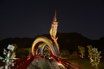 Night scene of Naga body is called Grandpa Phaya Sri Phet Khiri Mahamuni Srisutthonakarat Enshrined...