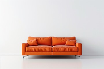 Bright orange couch against a white wall, suitable for furniture or interior design concepts
