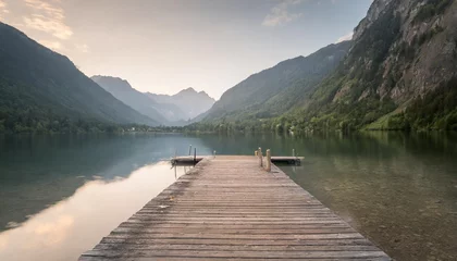 Rolgordijnen wooden pier with clear lake in the alps in summer © joesph