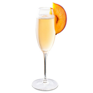 Sparkling Wine and Peach Pure Cocktail served in a transparent champagne flute