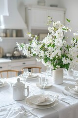 A beautifully set table with white plates and silverware, perfect for formal dining occasions