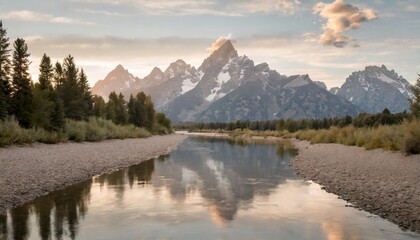 reflections of the tetons in the snake river in grand teton national park