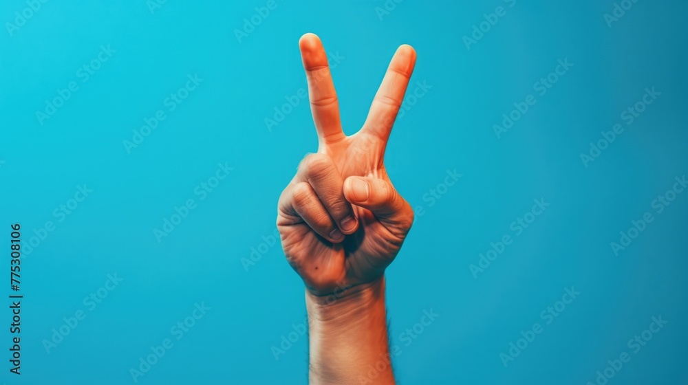 Poster A person making a peace sign gesture. Suitable for various concepts and designs