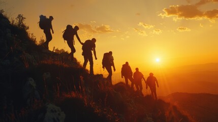 A group of people hiking up a hill during sunset. Suitable for outdoor and adventure themes