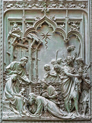 MILAN, ITALY - SEPTEMBER 16, 2024: The detail from main bronze gate of the Cathedral -   Three magi -  by Ludovico Pogliaghi (1906). - 775312159