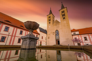 Premonstratensian Monastery from 12th century and the Romanesque church of Annunciation of Virgin Mary. Milevsko, Czech Republic. - obrazy, fototapety, plakaty