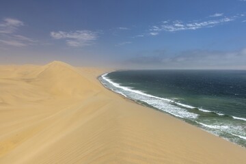 Picture of the dunes of Sandwich Harbor in Namibia on the Atlantic coast during the day