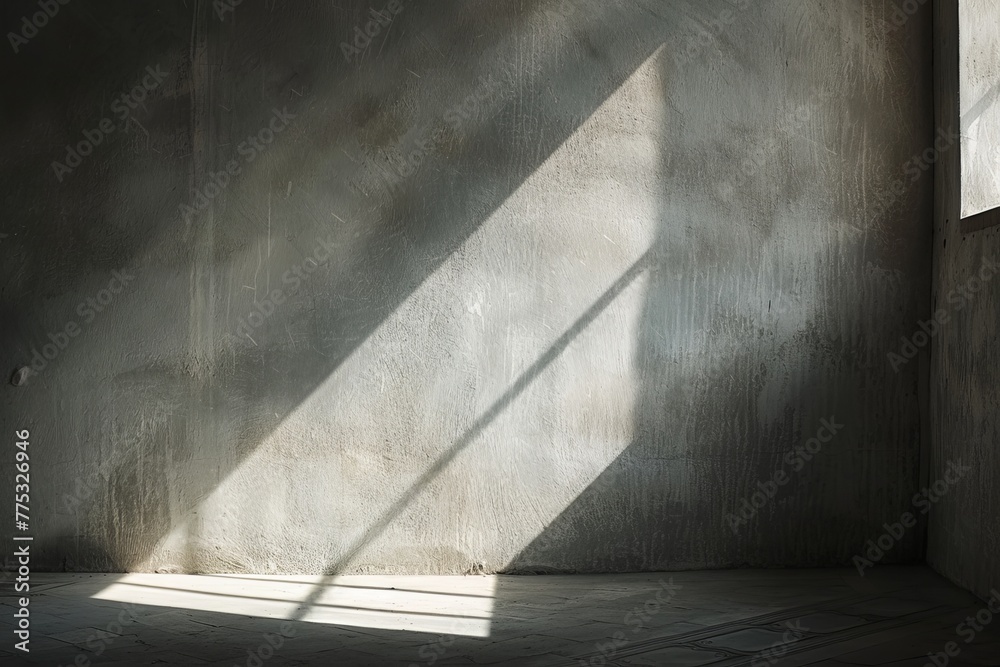 Poster a stark play of light and shadow on a concrete wall, giving an abstract and minimalistic feel