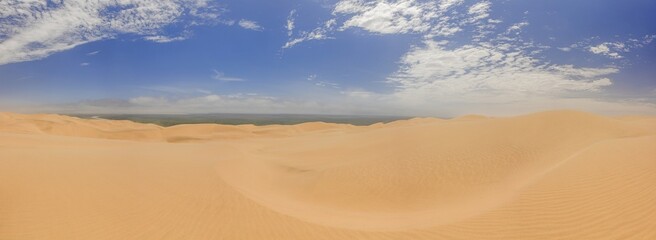Picture of the dunes of Sandwich Harbor in Namibia on the Atlantic coast during the day