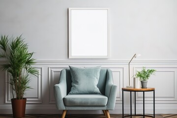 Mockup of empty framed picture over blue armchair, coffee table and potted plants in living room interior