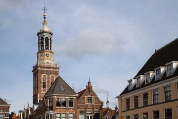City tower and clock tower - De Nieuwe Toren, in the Dutch hanseatic city of Kampen - obrazy, fototapety, plakaty