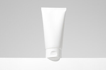 Empty white plastic tubes for cosmetics. Mockup. Packaging for cream, gel, serum, advertising and...