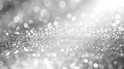 Close-up of silver glitter with soft focus - A detailed view of silver sparkling glitter, giving a sense of celebration and glamour suitable for backgrounds