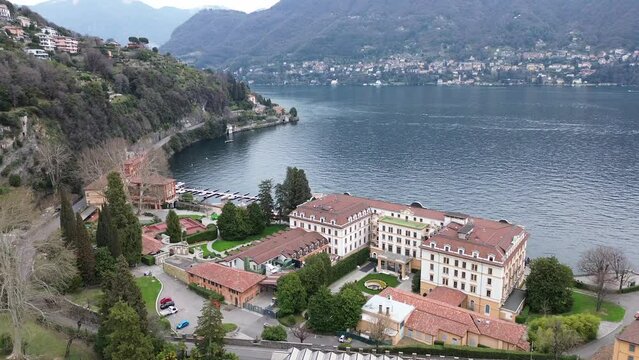 cinematic effect of aerial view about fantastic landscape of Villa D'Este with blue lake background 3