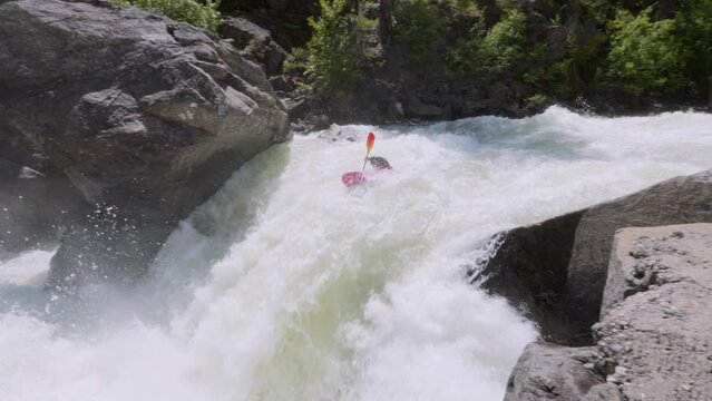 Kayaking Over a Waterfall in Slow Motion