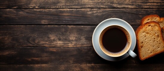 Close-up image showcasing a steaming cup of coffee next to a piece of sliced bread - Powered by Adobe