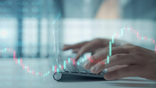 Trader is working with a computer screen that displays stock charts and data analysis. Broker Trading Online
