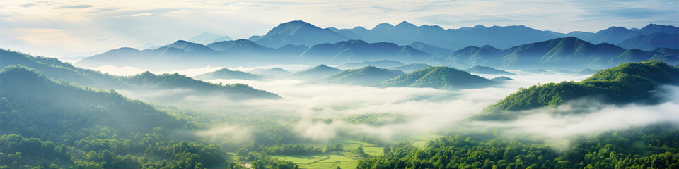 Mountains panorama with coluds and fog. banner
