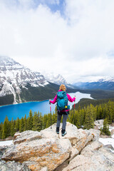 Young woman in Peyto lake, Banff National Park, Canada