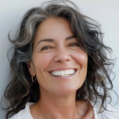 close up portrait of a beautiful 52 years old woman on a white background,