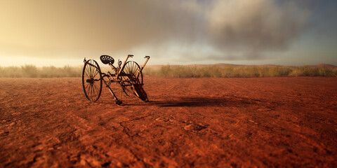 Ancient cultivator in desolate desert at sunset with cloudy sky.