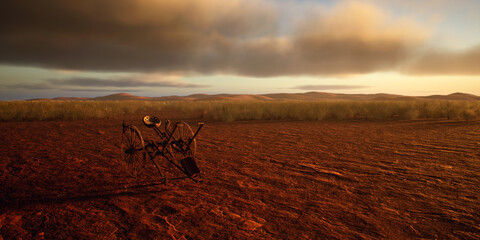 Ancient cultivator in desolate desert at sunset with cloudy sky. - 775370132