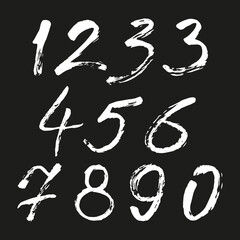 Set of calligraphic numbers painted by white brush on isolated black background. Lettering for your design. Vector illustration.