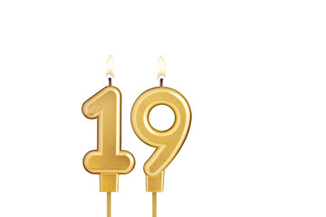 Birthday candle number 19 on white background