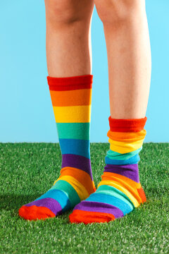 Colorful rainbow socks in springtime setting