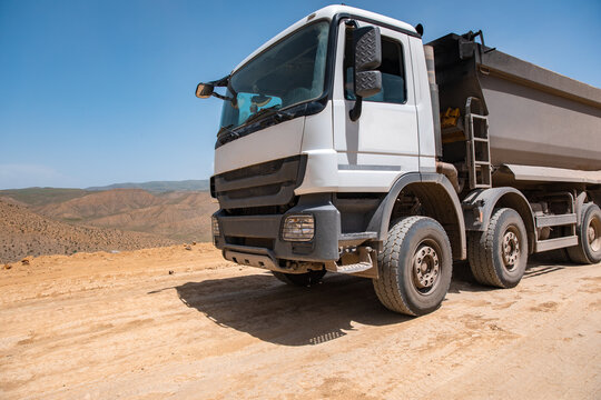Construction work in the mountains, while the truck is working. stock photo