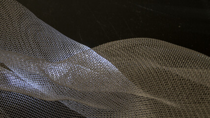 metallic abstraction, metal mesh on black background