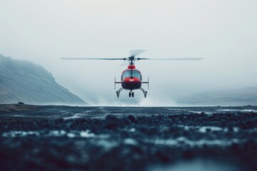 Emergency helicopter landing on rugged terrain for medical evacuation - obrazy, fototapety, plakaty