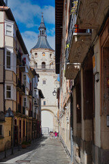 Vitoria-Gasteiz, Euzkadi. Spain. Old town street. In the background the church of San Pedro