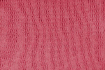 Red knitted woolen jersey fabric, sweater, pullover texture background. Fabric abstract backdrop,...