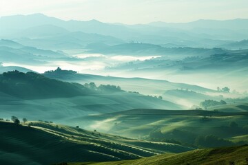 a foggy landscape with rolling hills and hills