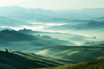 Fototapete a foggy landscape with rolling hills and hills © Aliaksandr Siamko
