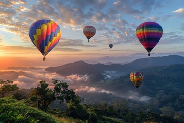 hot air balloons flying over a valley
