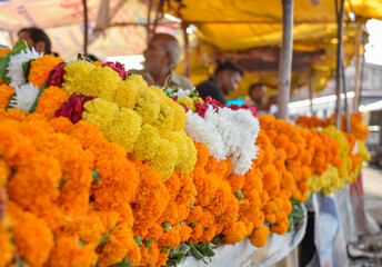 Flower market and bazaars with great variety of colorful flowers in India
