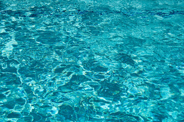 Background of water, surface blue swimming pool.