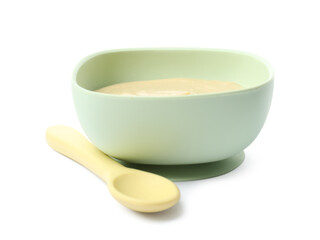 Tasty baby food in bowl and spoon isolated on white